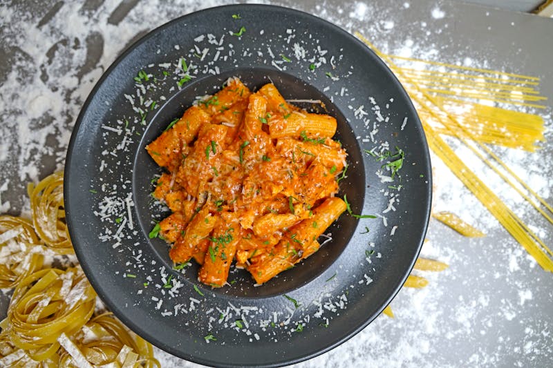 Rigatoni pasta with braised short rib and tomato sauce
